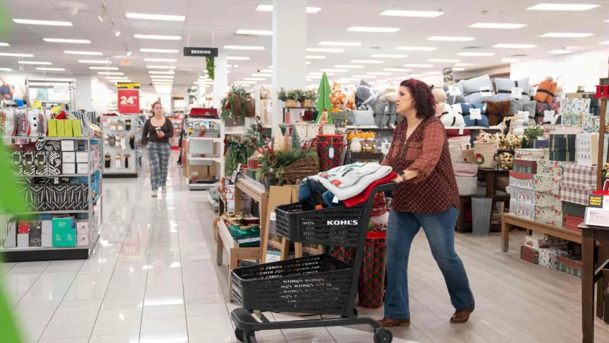 Cautious shoppers step up spending to start holiday season