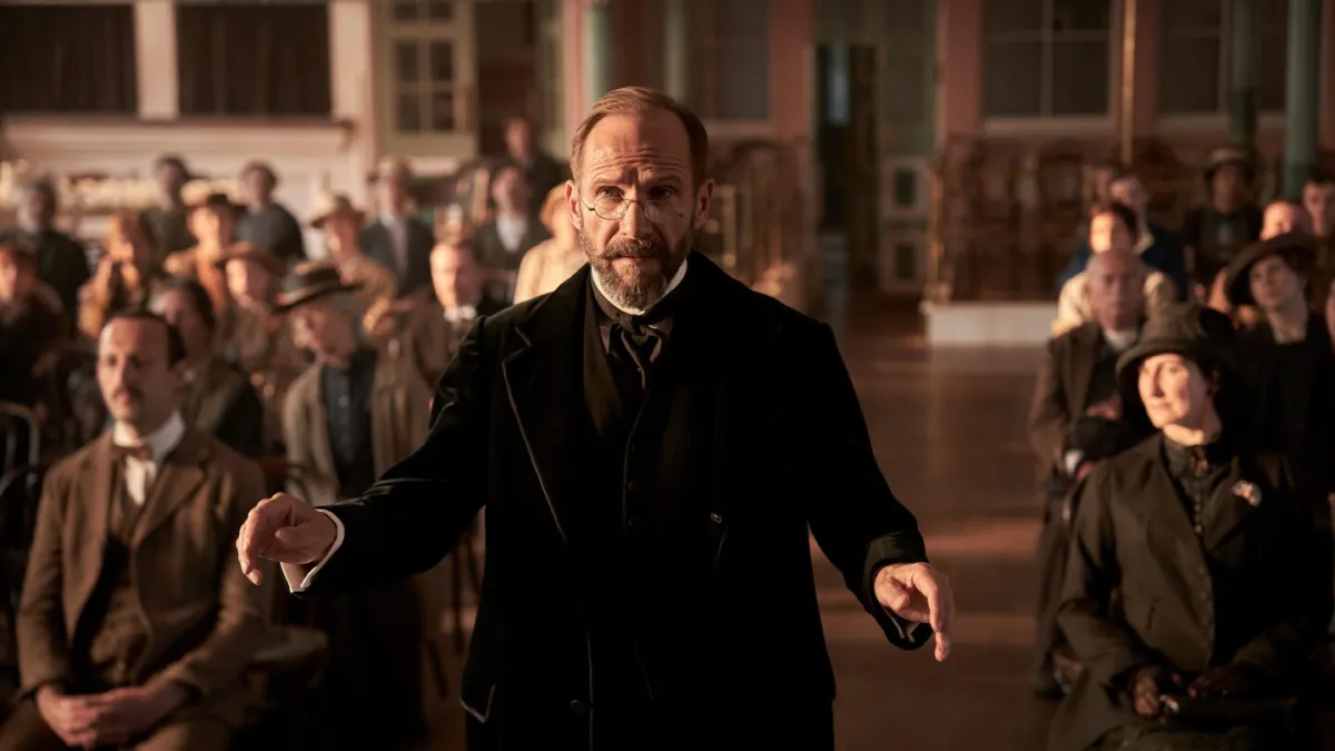 Movie Review: Ralph Fiennes shines in ‘The Choral,’ a heartfelt WWI drama about the power of music