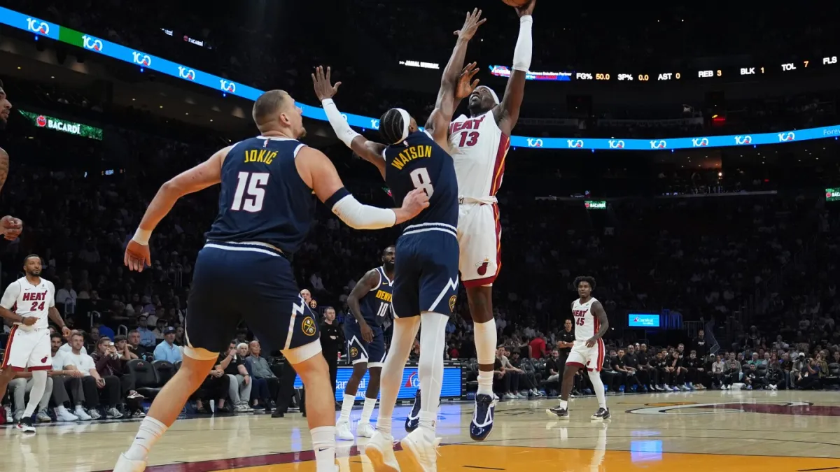 Nuggets star Nikola Jokic hurts left knee, limps off court at halftime in Miami