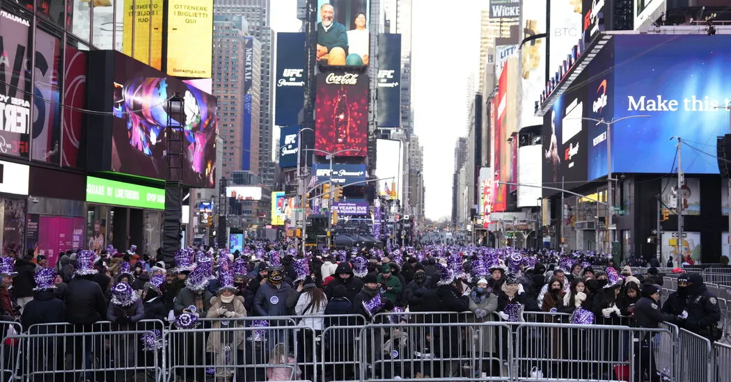 New Year’s Eve Crowds Brave Cold at NYC’s Times Square to Ring in 2026