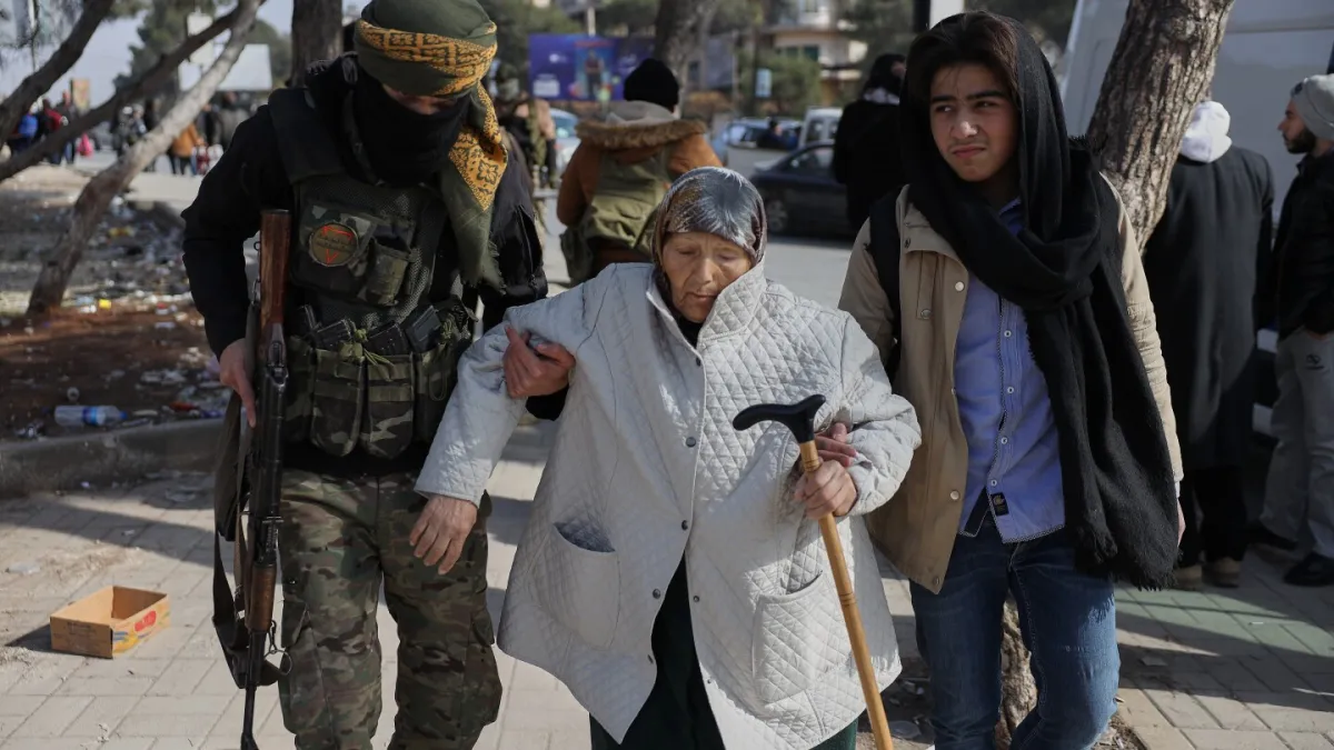 Civilians flee Aleppo as clashes between Syrian government and Kurdish forces escalate