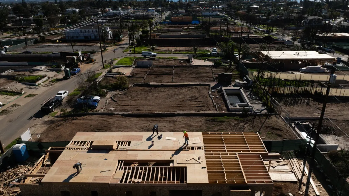 Fewer than a dozen homes have been rebuilt a year after being burned down in LA-area wildfires